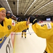 MALMO, SWEDEN - MARCH 28: Sweden's Kim Martin Hasson #30 and Johanna Fallman #5 celebrate at the bench after a first period goal against Japan during preliminary round action at the 2015 IIHF Ice Hockey Women's World Championship. (Photo by Andre Ringuette/HHOF-IIHF Images)

